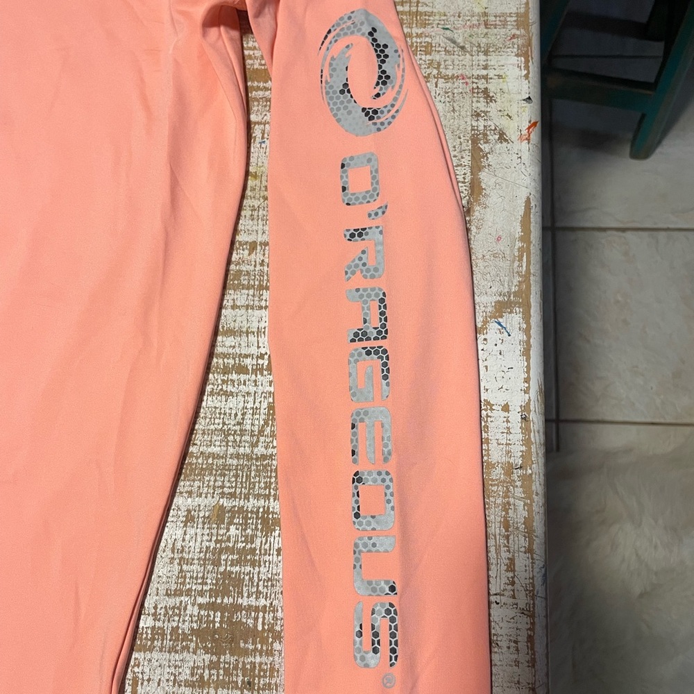Peach colored or o’rageous long sleeve shirt